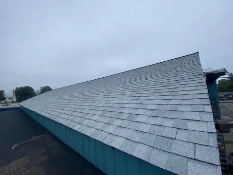 Slide of Supreme Roofing