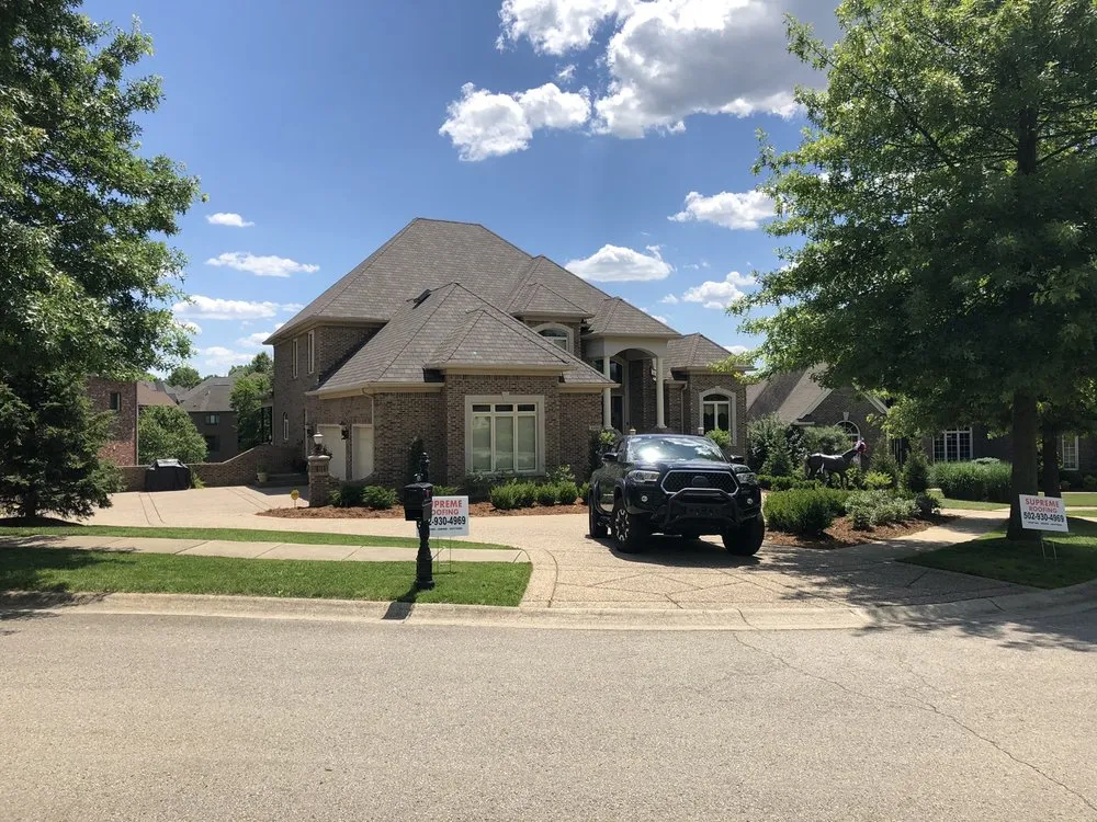 Slide of Supreme Roofing