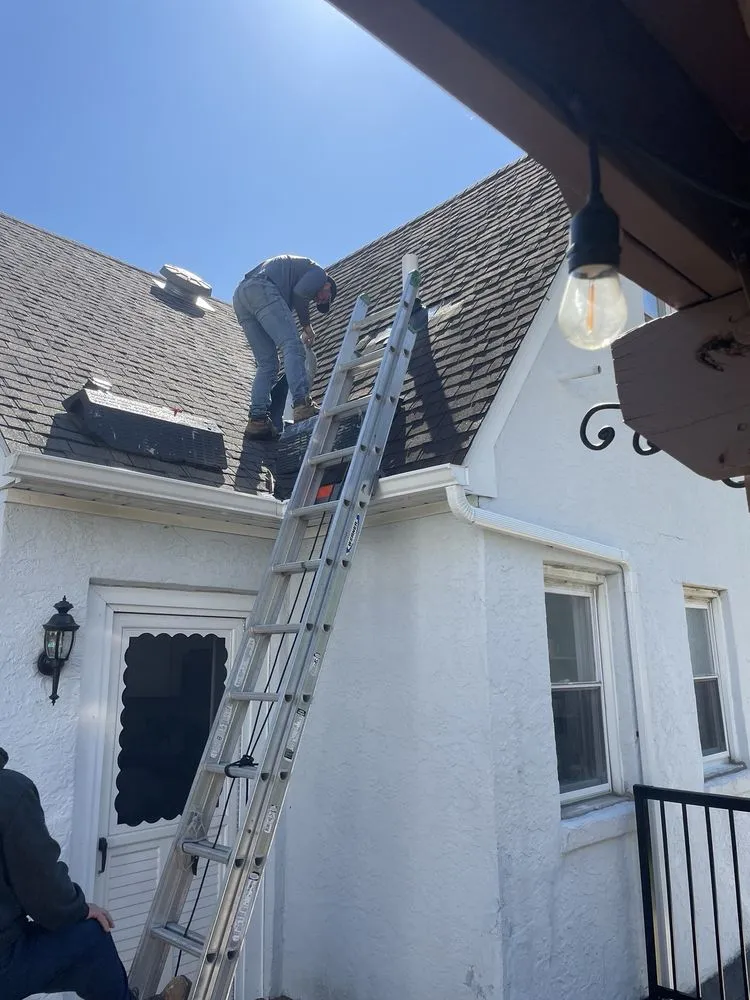 Slide of Supreme Roofing