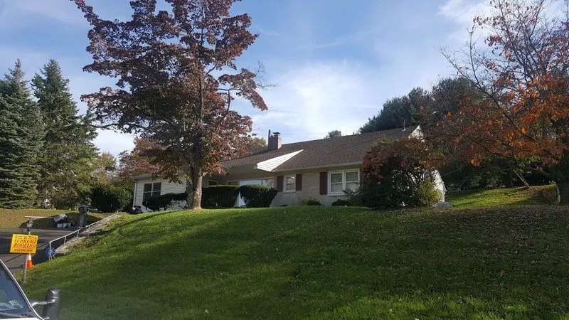 Slide of Supreme Team Roofing