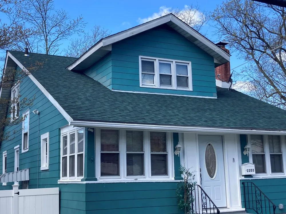 Slide of Sure Roofing & Exteriors