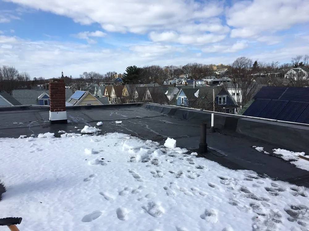 Slide of Susi & Sons Roofing