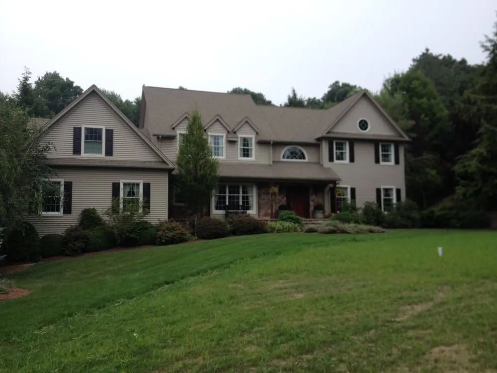 Slide of Sussex County Roof Cleaning