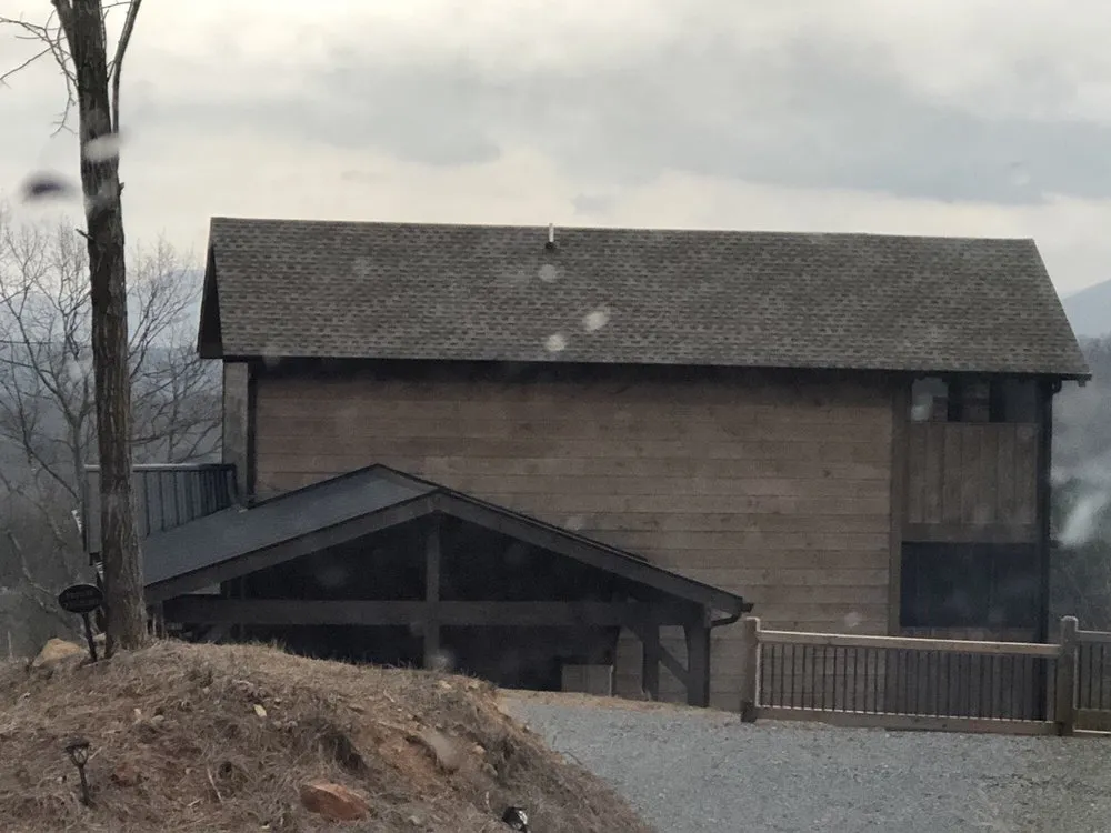 Slide of Sutton Roofing & Construction Company