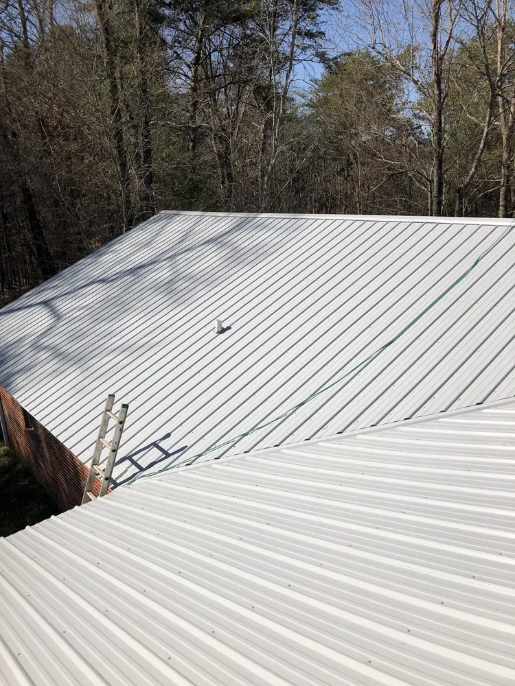 Slide of Sutton Roofing & Construction Company