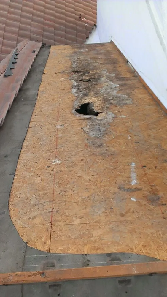 Slide of Sutton Roofing and Solar