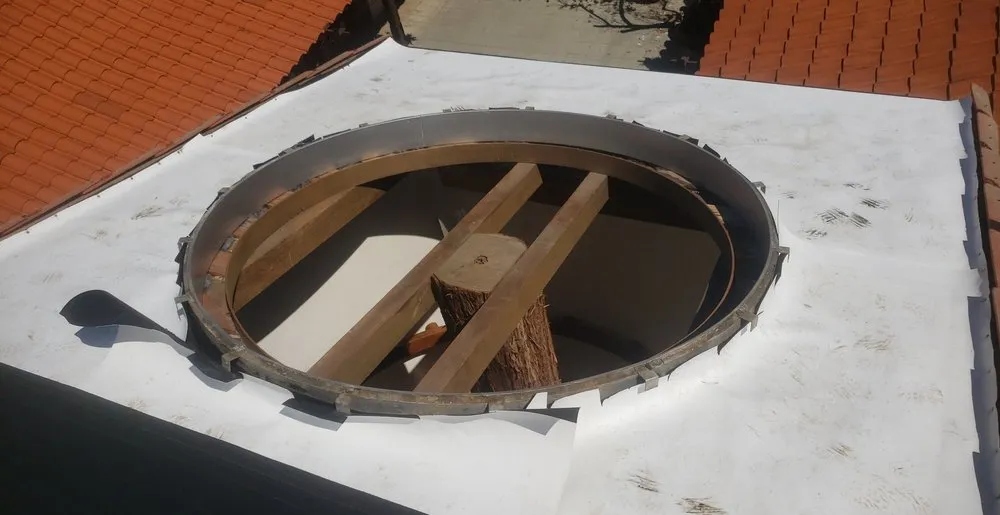 Slide of Sutton Roofing and Solar