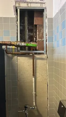 Swami USA Construction Logo