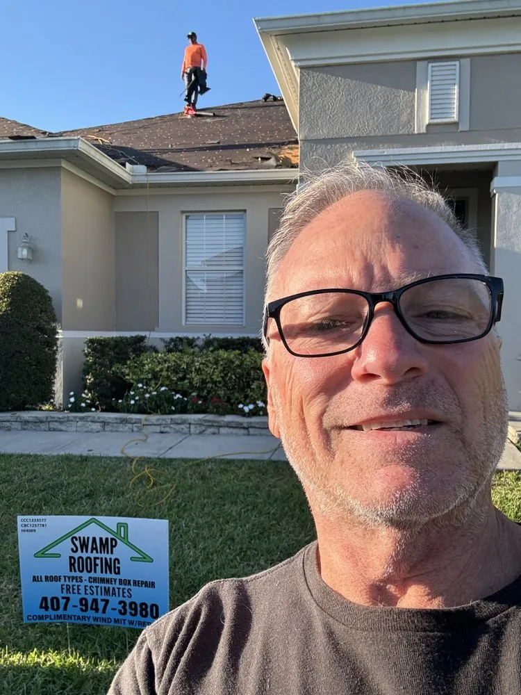 Slide of Swamp Roofing