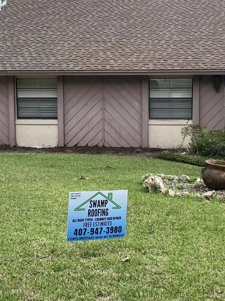 Slide of Swamp Roofing