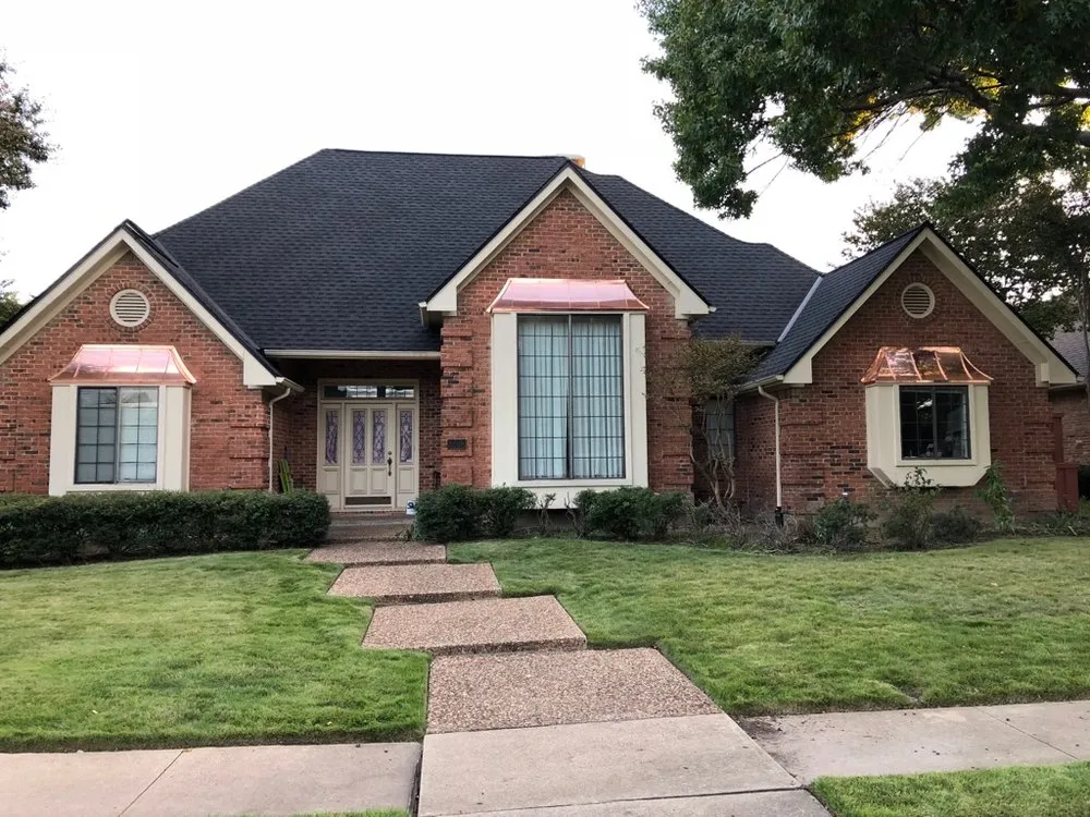 Slide of Swan Roofing