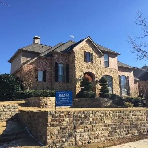 Slide of Swan Roofing