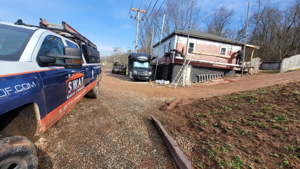 Slide of Swat Roofing