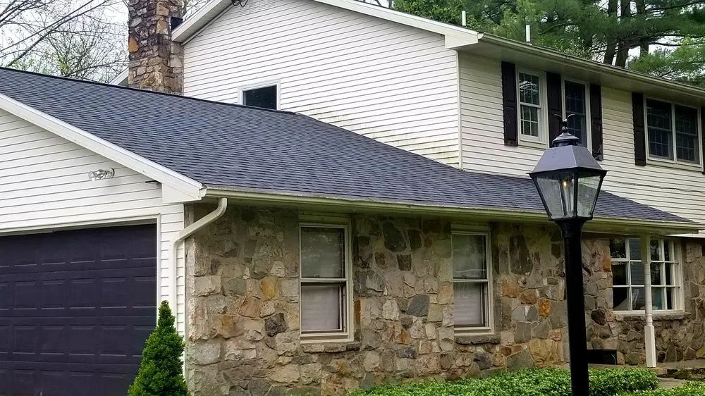 Slide of Sweeney's Reliable Roofing