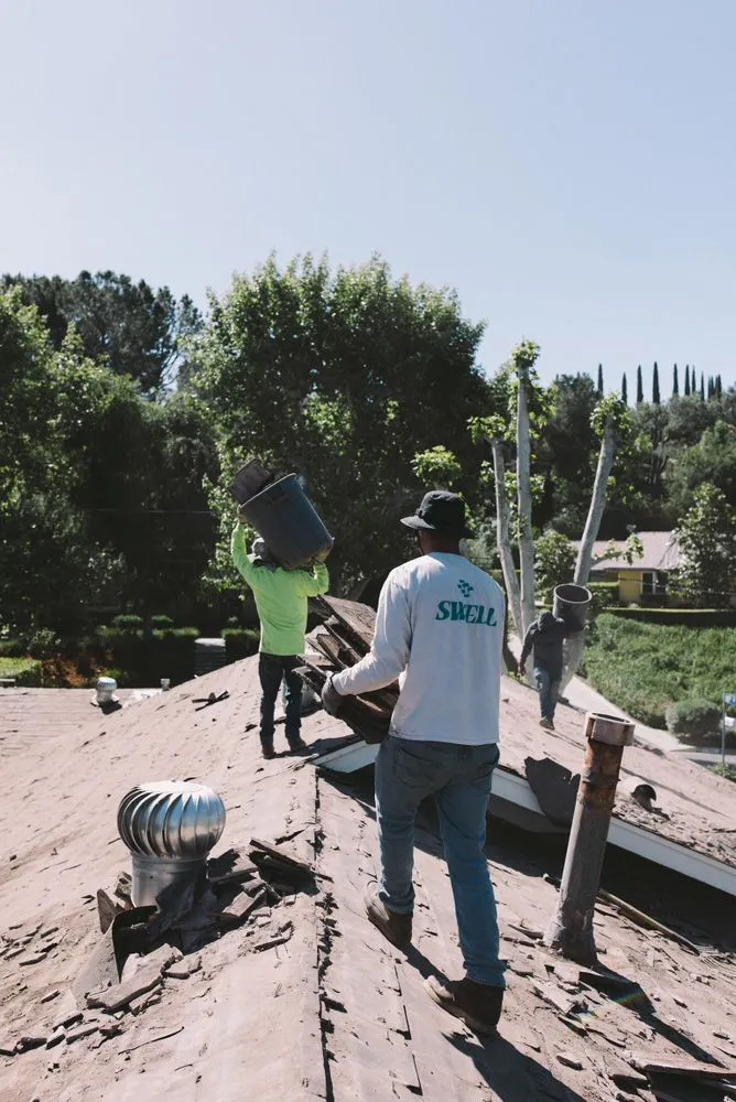 Slide of Swell Roofing