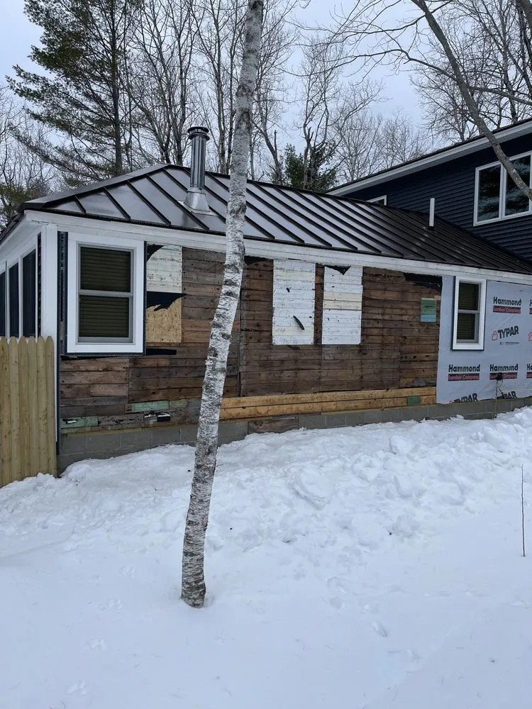 Slide of Swift Carpentry & Harvey's Management