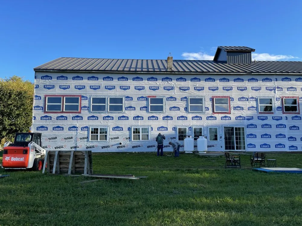 Slide of Swift Carpentry & Harvey's Management