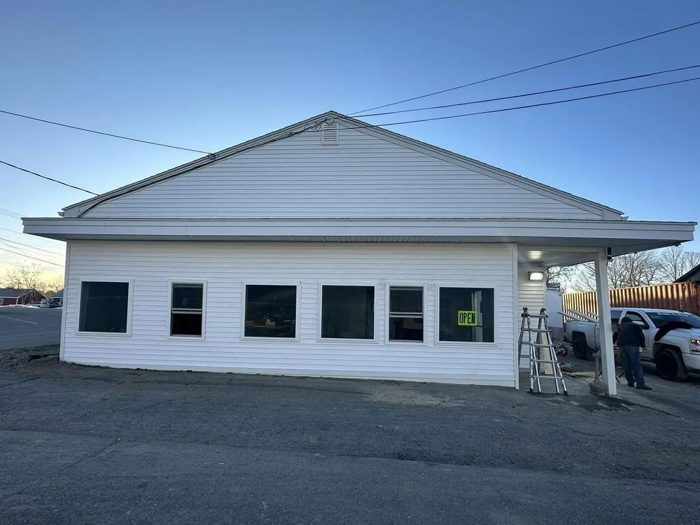 Slide of Swift Carpentry & Harvey's Management