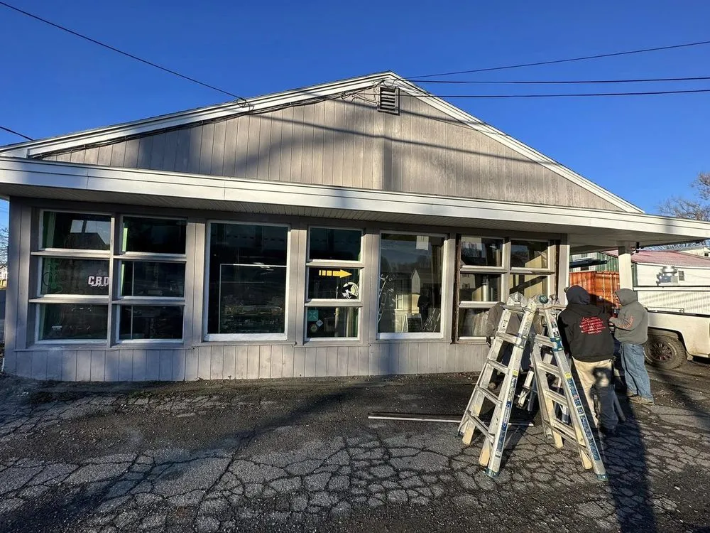 Slide of Swift Carpentry & Harvey's Management