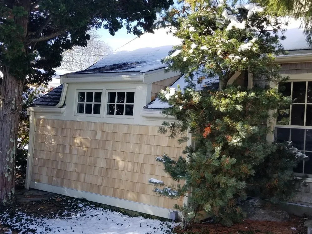 Licensed storm damage roof repair in North Windham, CT by Swift Waters Gutters and Roofing
