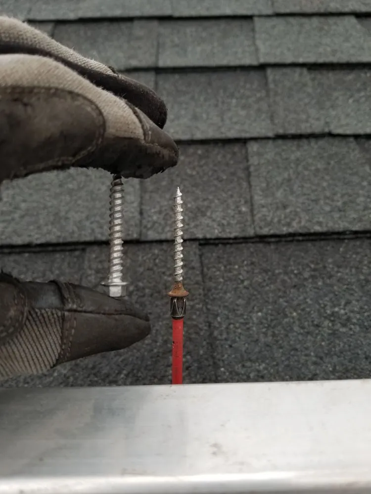 Expert storm damage roof repair same-day service in North Windham, CT by Swift Waters Gutters and Roofing