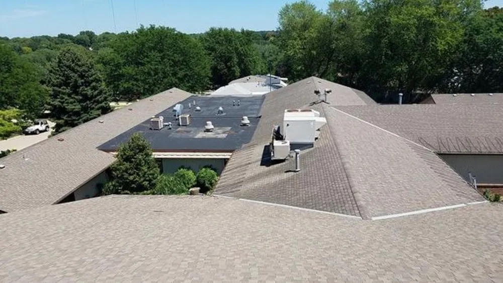 Slide of Synergy Roofing Group