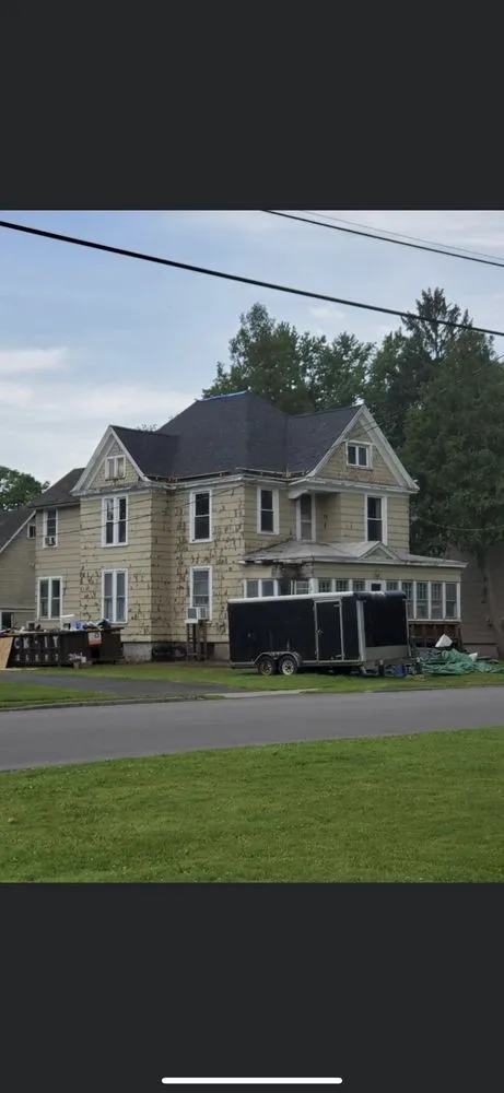 Slide of Syracuse Roofing Services