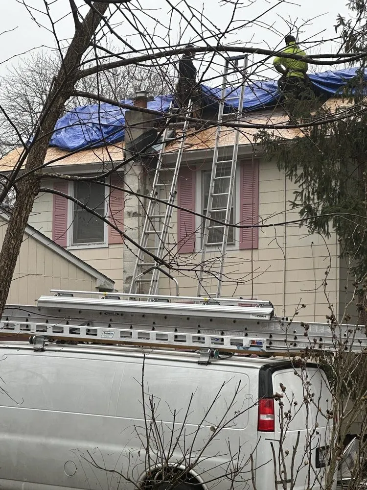 Slide of Syracuse Roofing Services