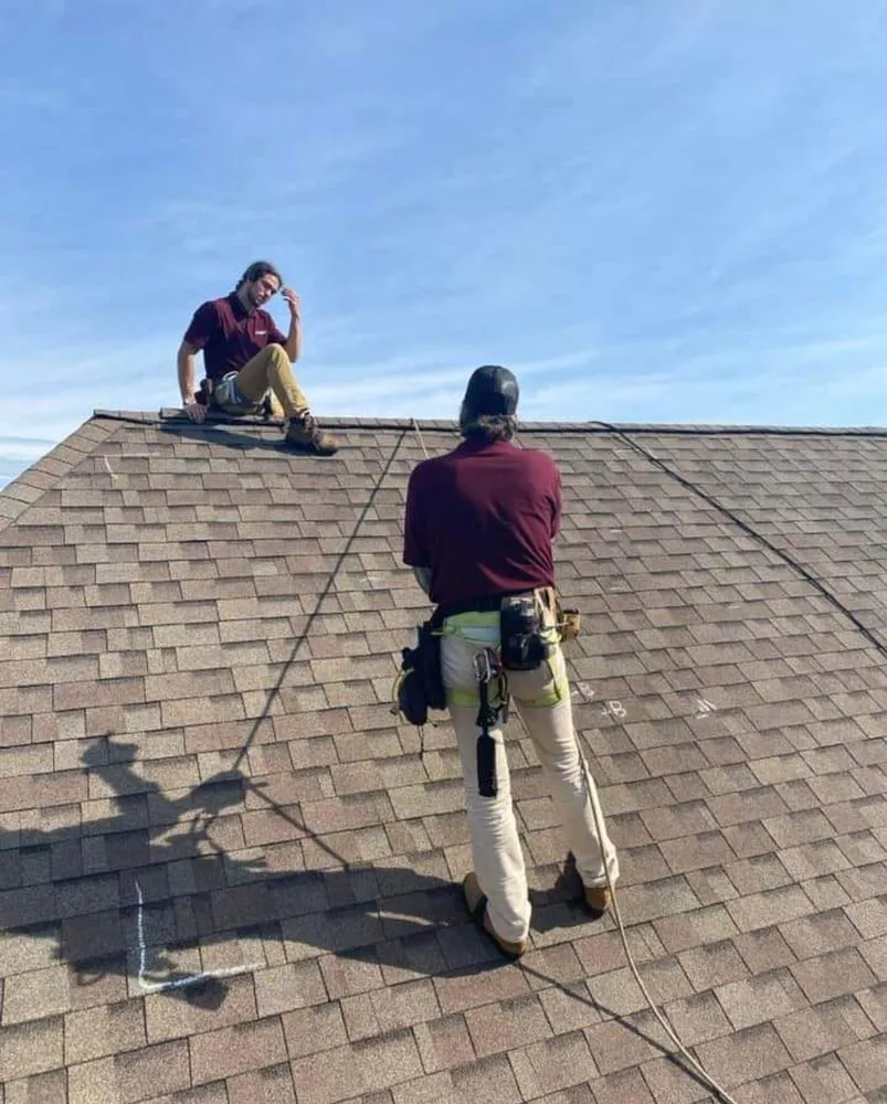 Slide of Szott's Roofing