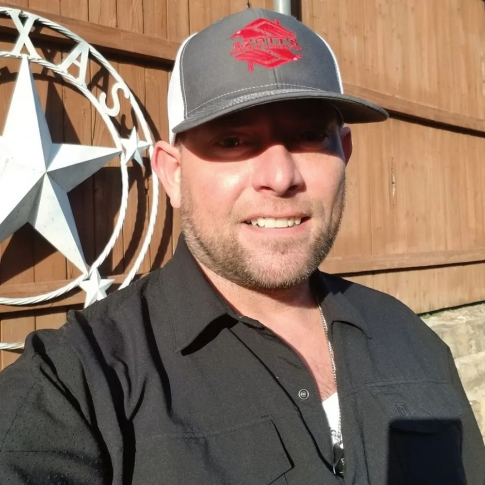 Slide of Szott's Roofing