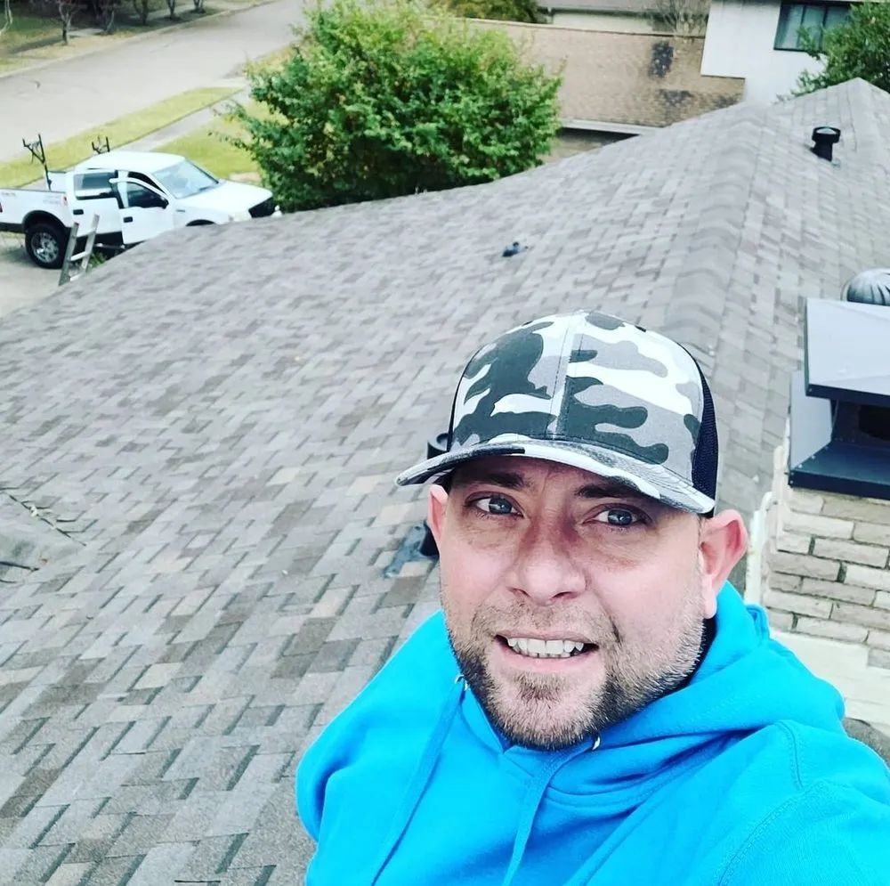 Slide of Szott's Roofing