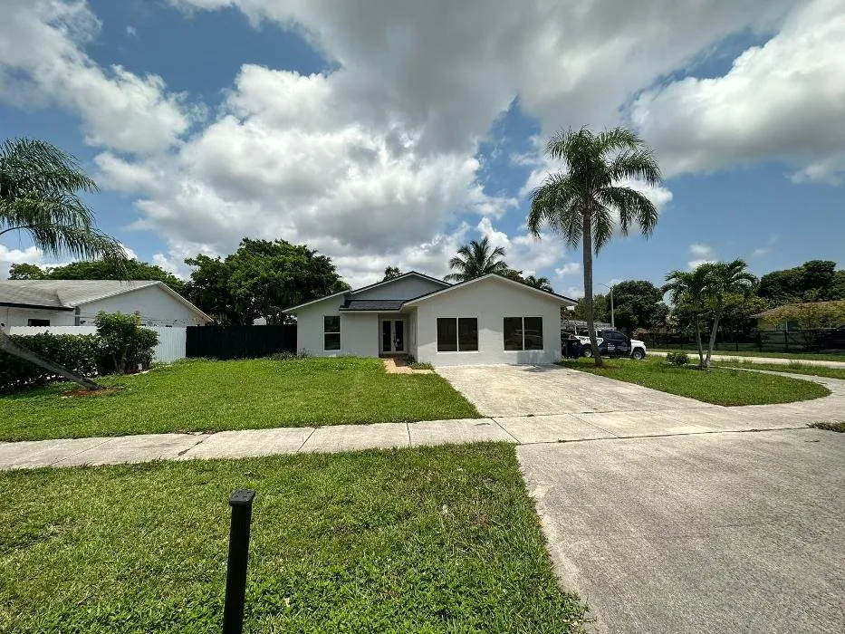 Slide of T & E Roofing