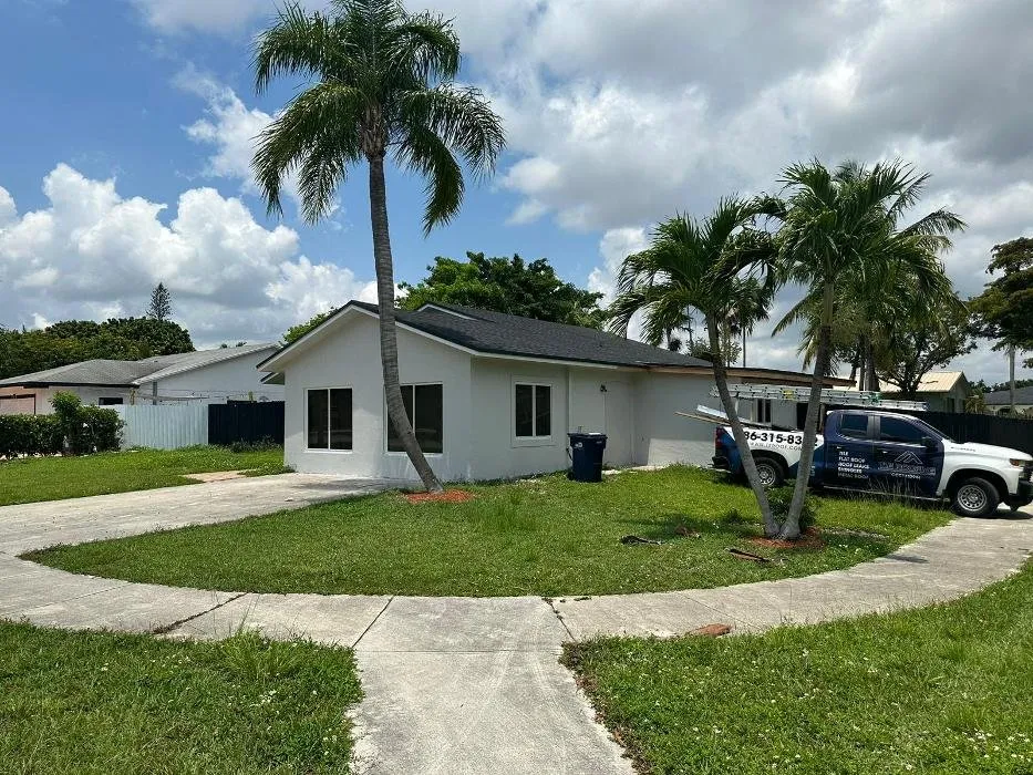 Slide of T & E Roofing