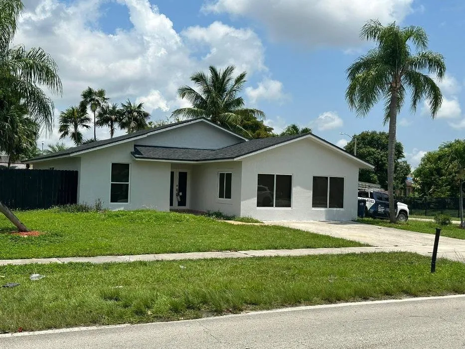 Slide of T & E Roofing