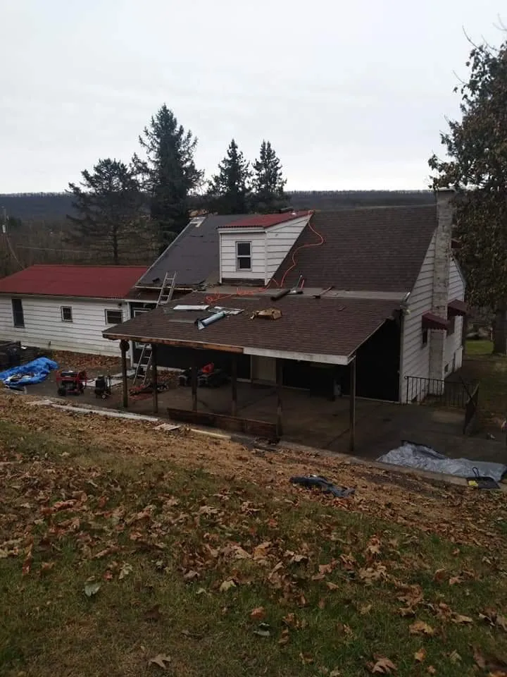 Local flat roof repair with free inspection in Marshallton, PA by T & K Custom Contracting