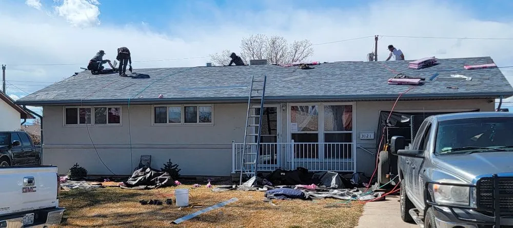 Slide of T & L Roofing Experts