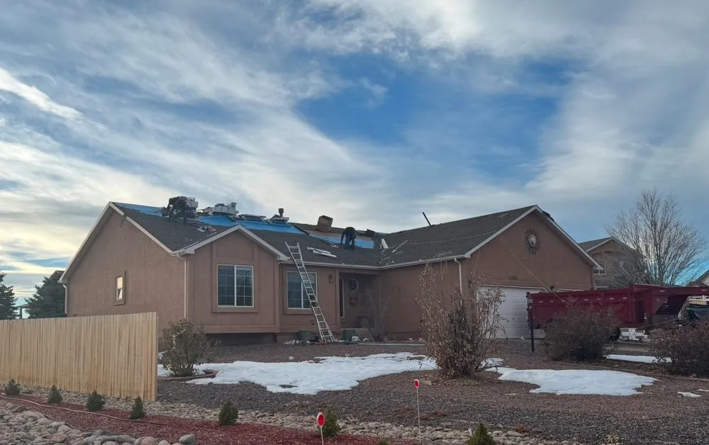 Slide of T & L Roofing Experts