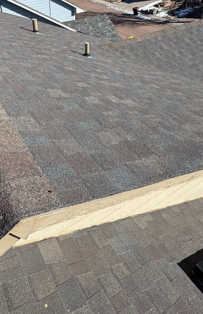 Slide of T & L Roofing Experts