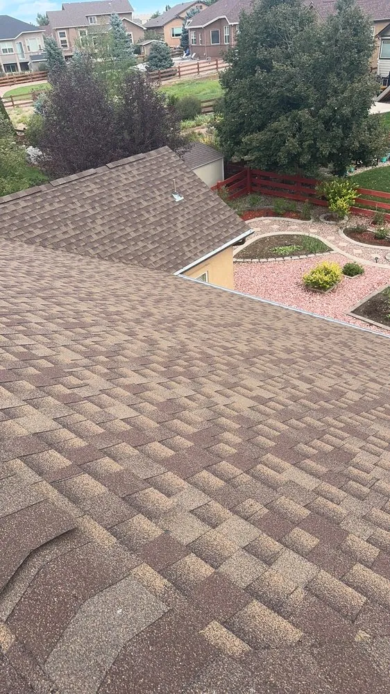 Slide of T & L Roofing Experts