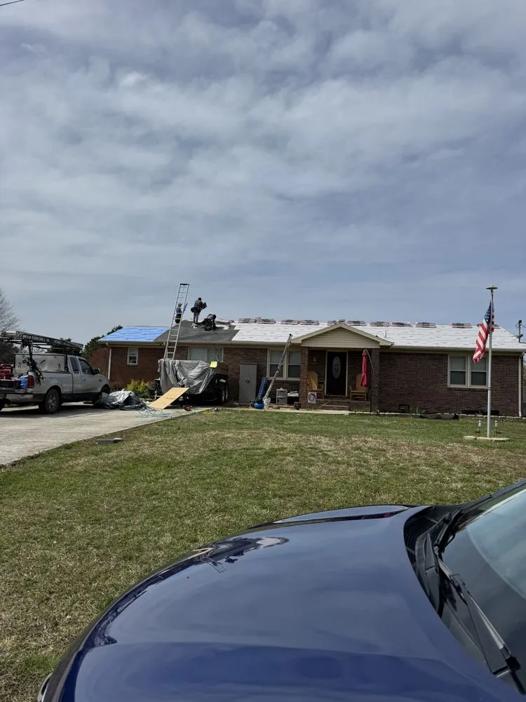 Slide of T & L Roofing