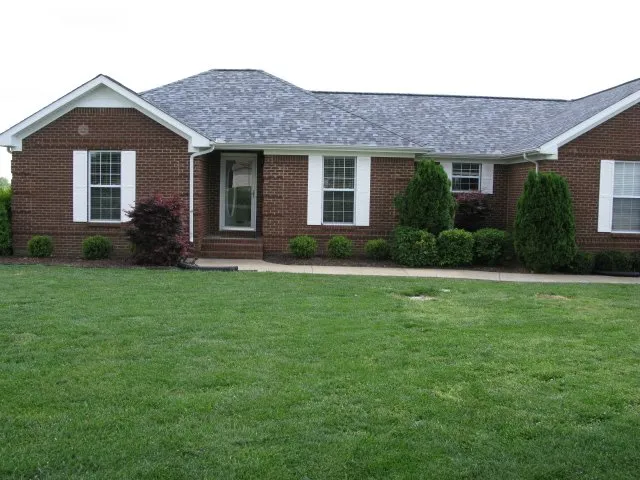 Slide of T & L Roofing