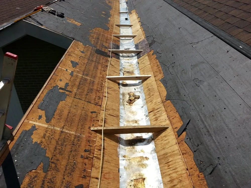 Slide of T & L Roofing