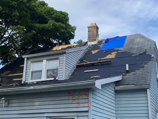 T & M Construction Logo