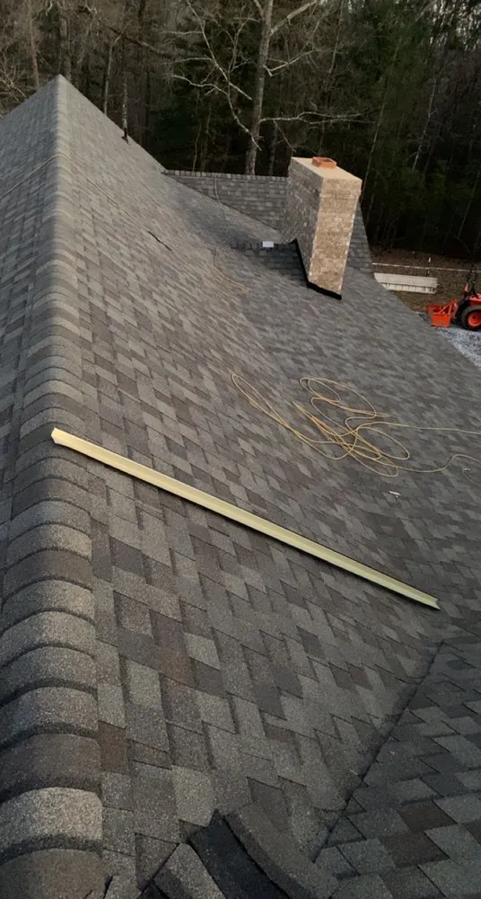 Slide of T & M Roofing