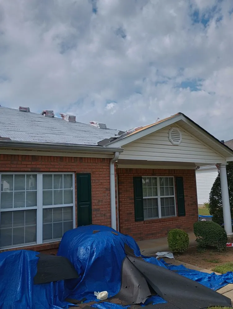 Slide of T & R Roofing