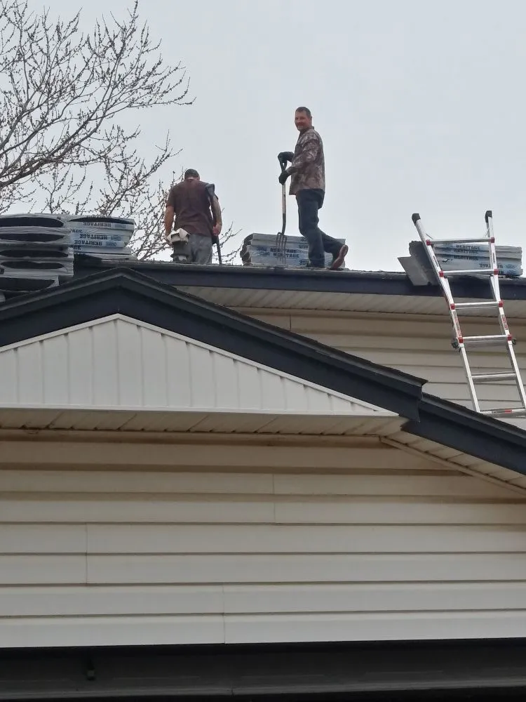 Slide of T & T Roofing