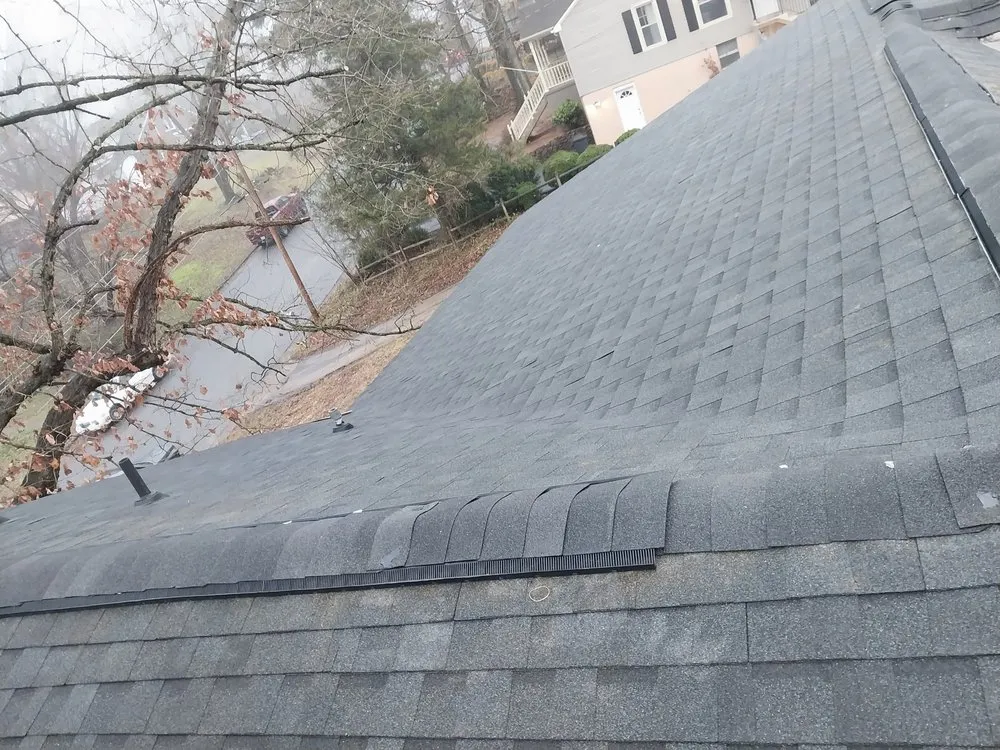 Reliable residential roofing service same-day service in Pelham, NC by T and T home remodeling services and roofing