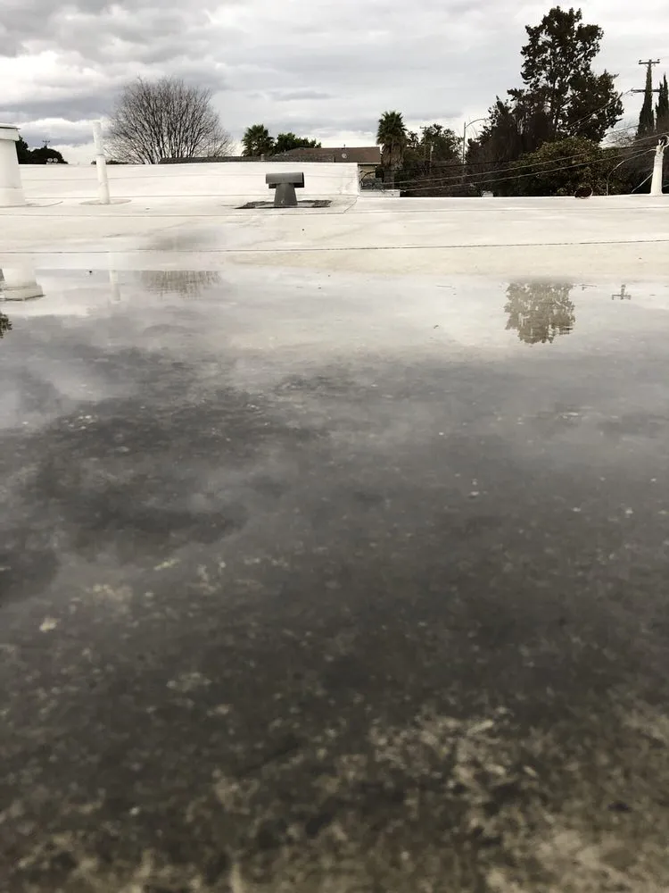 Slide of T D Roofing