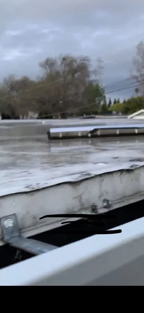 Slide of T D Roofing