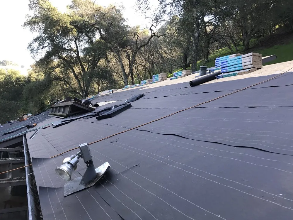 Slide of T D Roofing